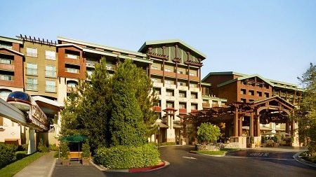 The entrance of Disney’s Grand Californian Hotel and Spa with the Disneyland Monorail at the Disneyland Resort