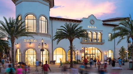 People standing outside of the ZARA store at Disney Springs People standing outside of the ZARA store at Disney Springs