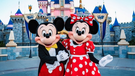Mickey Mouse and Minnie Mouse in front of Sleeping Beauty Castle at Disneyland Park