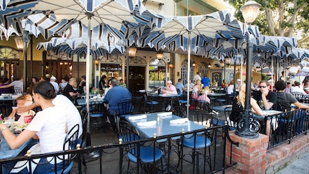 Outdoor Café Orleans tables line a small corner of New Orleans Square in Disneyland Park