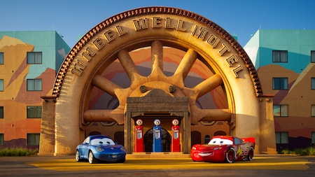 Outdoor signage reading ‘Wheel Well Motel’ located near the pool at Disney’s Art of Animation Resort