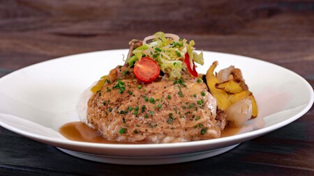 Roasted chicken with grilled vegetables and a delicious sauce.