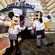 Mickey Mouse and Goofy dressed as chefs with their arms outstretched