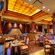 A Mexican restaurant featuring booths and tables