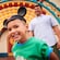 A little boy and a little girl, both wearing Mickey Mouse Ears, are smiling with their parents at Disney California Adventure park.
