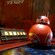 A BB series astromech droid spins atop an illuminated control panel.
