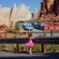 A little girl watches cars race at Radiator Springs Racers at Disney California Adventure Park