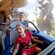 A girl and her parents hang on tight as they ride on the Matterhorn Bobsleds