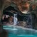A grotto with refreshing waterfalls in Cross Country Creek at Disney's Blizzard Beach