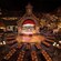 Bird's eye view of the dining, dance and stage areas at Biergarten Restaurant with long tables surrounding a wooden stage 