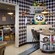 Dining area of 50's Prime Time Café with tables surrounded by mid-50's knick-knacks and memorabilia