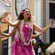 Two hula dancers performing with drummers at Disney Springs