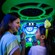 A mother and daughter smiling as they ride Buzz Lightyear's Space Ranger Spin at Magic Kingdom park