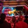 Guests watching a cosmic battle scene on screen in the Guardians of the Galaxy Cosmic Rewind queue