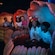 Pairs of Guests riding in seashells at The Seas with Nemo & Friends