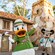 Goofy, Donald Duck and Mickey Mouse dressed in safari gear while standing in front of Tusker House Restaurant 