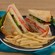 A Club sandwich with a side of fries