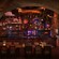 A weathered, arched doorway leads into The Beak and Barrel, a pirate themed tavern at Magic Kingdom park