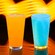 Tres vasos con granizado congelado de color naranja, azul y marrón de Astrofizz