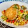 Palm Cakes with a side of couscous and vegetables, from Coral Reef Restaurant at Epcot