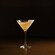 A cocktail in a martini glass