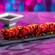 A Churro Drumstick topped with chocolate sauce and sprinkles from FØØD by Swedish Chef
