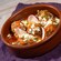 Spiced Lamb Kefta topped with feta cheese and tomato sauce at Spice Road Table
