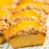 Glazed crumb cake squares on a serving tray