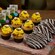 A platter of assorted miniature desserts, including cupcakes, cookies and brownies