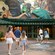 Family walking toward the animal mural entrance of Conservation Station