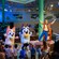 Performers and children dance with Bluey and Bingo