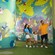 A family walks through the nature themed halls of Bluey’s Wild World