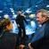 A teenage girl and her father, both in wetsuits at the Epcot DiveQuest facility  