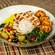 The Combination Bowl, a dish that includes Chermoula spiced shrimp and grilled chicken at The Mara in Disney's Animal Kingdom Lodge