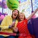 A mother and daughter enjoying their turn at the Inside Out Emotional Whirlwind attraction at Pixar Pier in Disney California Adventure Park