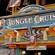 A wooden sign with spears and a carved duck's head identifies the entrance to Jungle Cruise