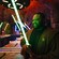 A guest in a Jedi robe holds a glowing lightsaber inside Savi's Workshop at Star Wars: Galaxy's Edge  