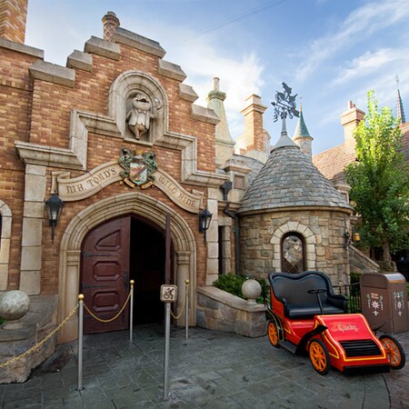 A motorcar waits at the entrance to Mr. Toad's Wild Ride in Disneyland Park