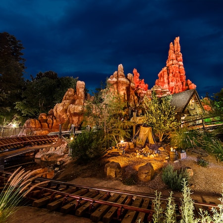 A section of Big Thunder Mountain Railroad with a hairpin curve and a campground