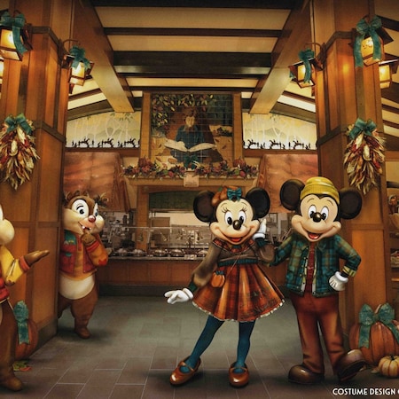 Mickey and Minnie Mouse, Chip and Dale and Pluto in autumn-themed clothing at Goofy's Kitchen