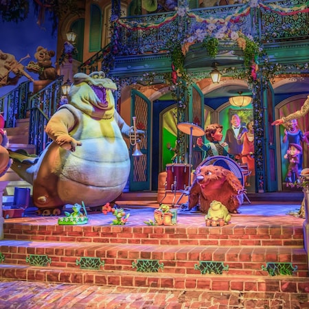 Louis, Byhalia, Princess Tiana and Prince Naveen perform onstage at the Tiana’s Bayou Adventure attraction