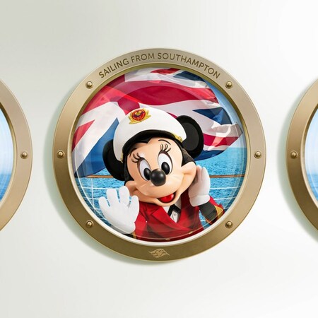 Minnie Mouse peers out from a cruise ship porthole