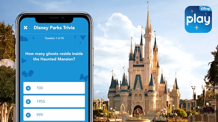 Cinderella Castle, the Play Disney Parks mobile app logo and a smartphone screen with text that reads “Disney Parks Trivia” and “How many ghosts reside inside the Haunted Mansion?”