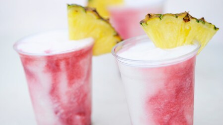 2 frozen drinks with pineapple slices
