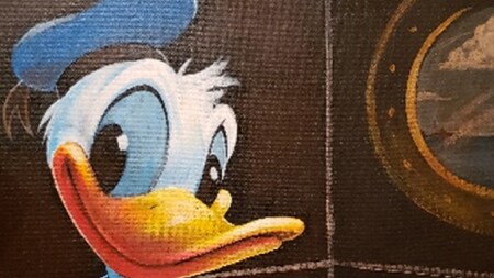 A colorful artwork depicts Donald Duck