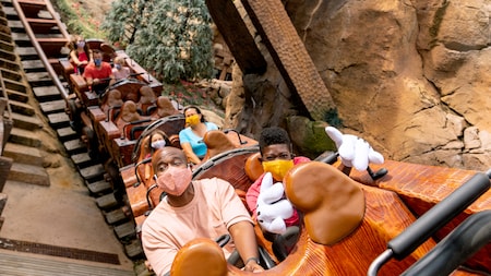 Dad and son enjoy socially distant ride on Disney's Seven Dwarfs Mine Train