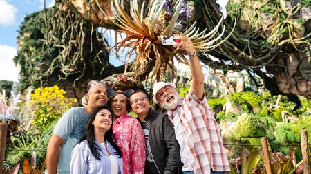 A group of people take a selfie at Pandora World of Avatar