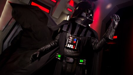 Darth Vader strikes a fearsome pose, his cape flowing in the breeze