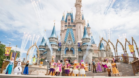 Against the backdrop of Cinderella Castle stands the full cast of Mickey’s Friendship Faire, including Mickey Mouse and friends, as well as characters from such Disney classics as Frozen and Tangled
