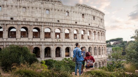 Guests in front of the Colosseum in Rome, Italy